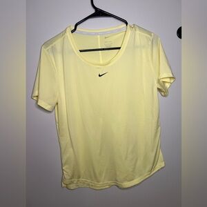 Pale yellow Nike shirt size S